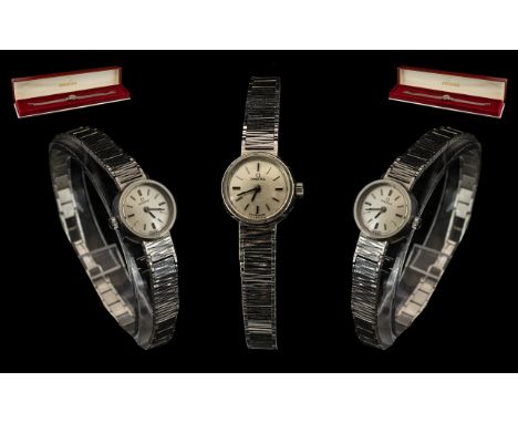 Omega - Ladies 9ct White Gold Mechanical Wind Bracelet Wrist Watch. Both Watch Case and Bracelet Marked For 9.735 c. 1970's /