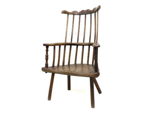 A Late 18th/Early 19th Century Ash Comb-Back Armchair, probably West Country, the double spindle back support above outswept 