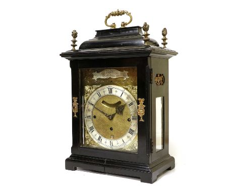 An Ebonised Chiming Table Clock, signed W Tomlinson, London, early 18th century, inverted bell top with carrying handle, flam