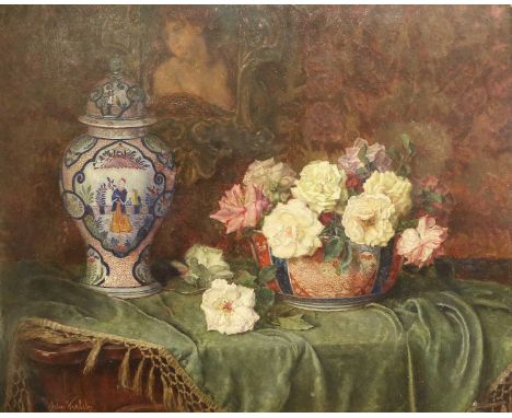 Anton Wrabetz (1876-1946)Still life of an Oriental jar and cover, and a bowl of mixed Roses on a card table, draped with a gr