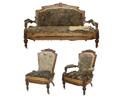 A Victorian Carved Walnut-Framed Three-Piece Suite, circa 1870, comprising:a two-seater sofa with moulded and carved frame su