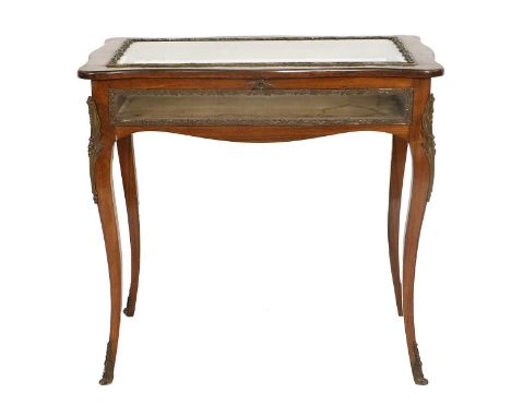 A Late 19th Century French Rosewood and Gilt-Metal-Mounted Bijouterie Table, in Louis XV-style, of serpentine-shape form with