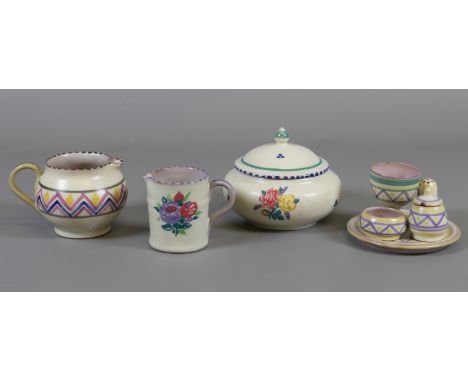 A quantity of Carter Stabler and Adams Poole pottery c1920s/30s. Including a small cruet set, two milk jugs and a lidded suga