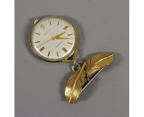 A Bulova gold capped manual lapel watch. The pin formed as two overlapping feathers, with centre seconds, satin dial and bato