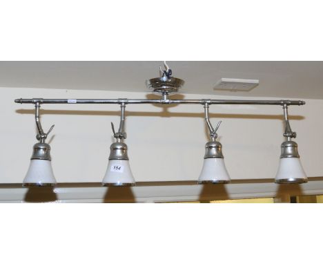 A four branch chrome light.