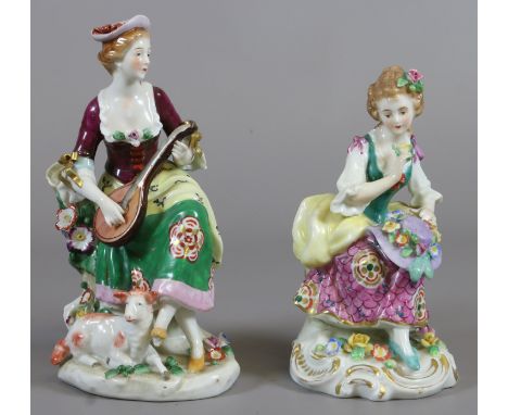 Two C19th Sampson Chelsea figures each formed as a seated maiden, one with a lute the other holding a flower painted red anch