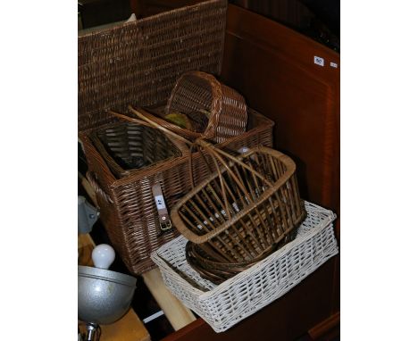 A collection of wicker work to include hamper and baskets.