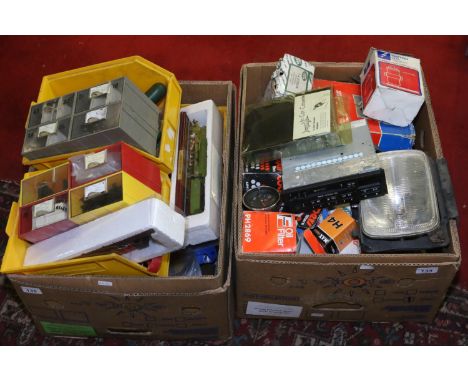 Two boxes of automotive parts and tools along with a model railway related items.