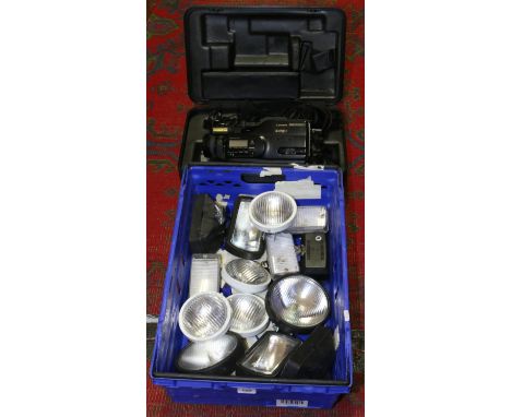 A box lot of automotive spotlights, along with a Mitsubishi Cine camera.