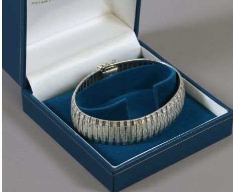 An Italian vintage silver bangle.