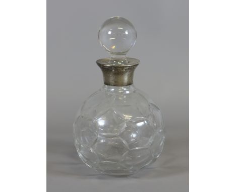 A silver mounted globular shaped cut glass decanter, assayed Sheffield 1994.