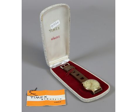 A vintage Timex Electric wristwatch in original box. With satin dial, baton and numeral markers and centre seconds.