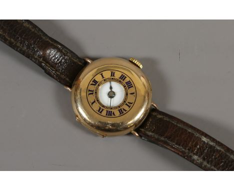 A 9 carat gold cased demi hunter manual wristwatch with enamel dial and wire lugs.    Condition Report. To be used as a guide