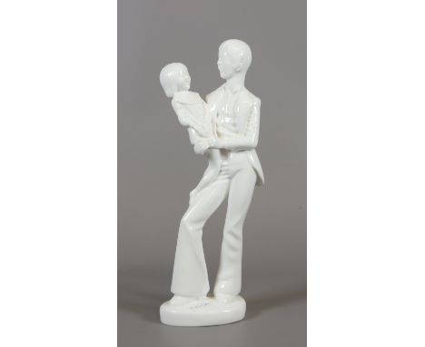 A white glazed Spode figure by Pauline Shone 'father & child'.