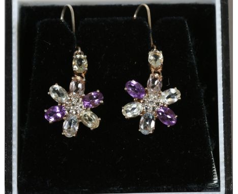 A pair of silver floriform earrings set with amethyst and coloured topaz stones.