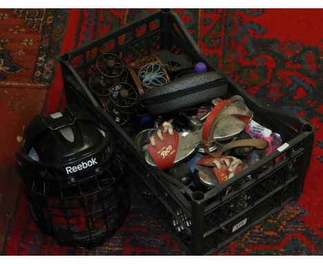 A box quantity of vintage sportswear to include helmet, roller blades etc.