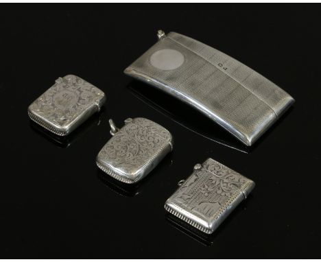 A George V silver rectangular concave vesta case with engine turned engraving assayed Birmingham 1925 and three other engrave