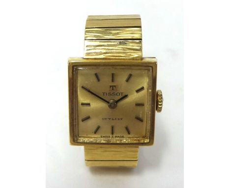Tissot, a Ladies 9ct gold wrist watch, with 9ct gold bracelet, (total weight 27.30g).