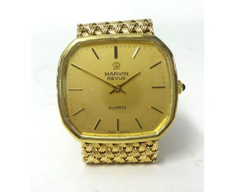 Gent’s 9ct yellow gold Marvin Revue quartz watch. Octagonal shaped champagne dial depicting baton indices on woven mesh desig