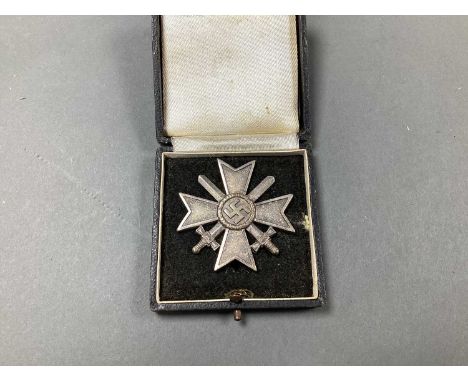 WWII German Third Reich War Merit Cross, with swords, 1st Class, manufacturer mark on pin L15, in presentation case.