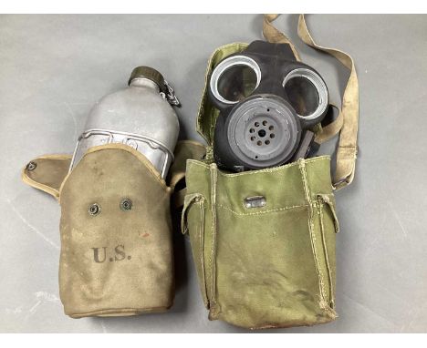 WWII British Mark II A Light Respirator and Webbing Pouch, respirator stamped with broad arrow and date '30/8/44'. French Mil