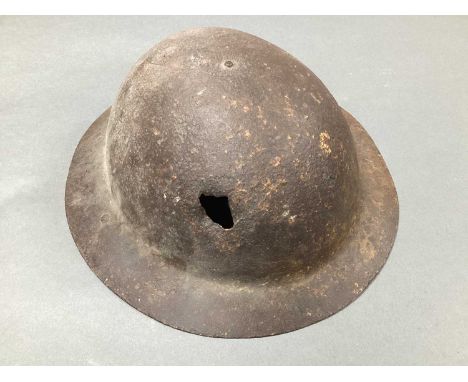 WWI British Army Raw Edge Brodie Helmet, with shrapnel hole, shell only, semi relic condition.