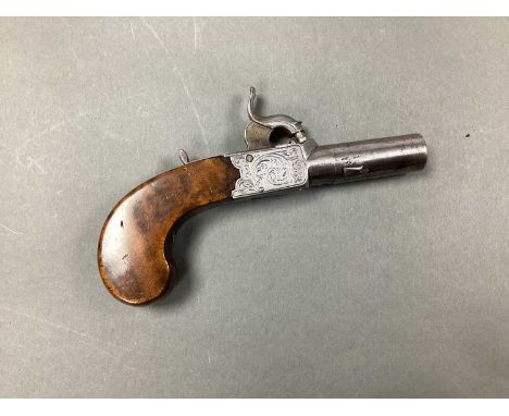 Mid XIX Century Box Lock Percussion Pistol, by Powell, turn off barrel, proof marks, ornate scrolls on lock and hammer.The pi