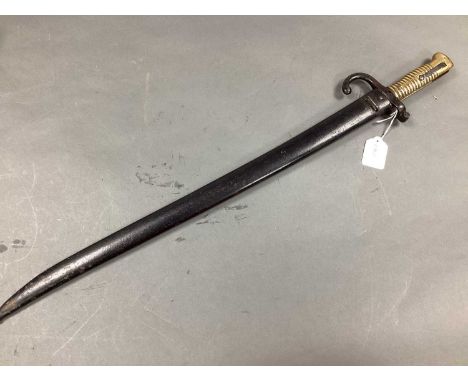 XIX Century French Model 1874 Chassepot Bayonet and Scabbard, bayonet manufacturer mark 'Mre N/e de Chat 7bre 1871'.