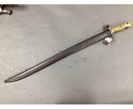 XIX Century French Model 1866 Chassepot Bayonet and Scabbard, bayonet manufacturer mark 'Mre N/e de Chat 9bre 1872'.