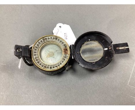 WWII British Prismatic Marching Compass, marked to rear of case, with broad arrow and 'T G Co. Ltd London No. B 205481 1942 M