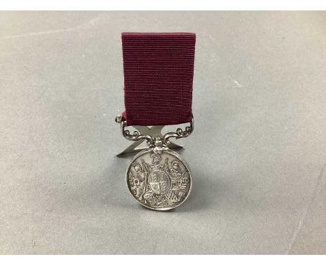 Army Long Service and Good Conduct Medal, adapted into menu card holder for use in officer's mess. Medal awarded to 324 Pte G