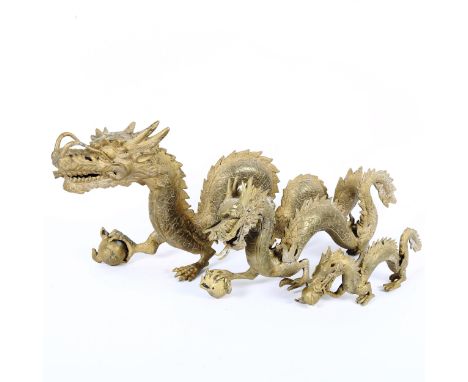 A graduated set of 3 Imperial Chinese brass dragon and pearl figures, largest length 50cm (3) 
