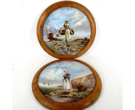 A pair of large 19th century French ceramic wall plates, with hand painted designs of fisher girls, signed A Delus, mounted i