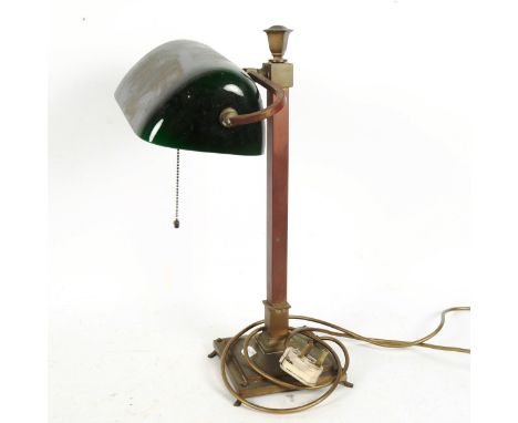 A brass and green glass swivel desk lamp, height 46cm (shade broken and re-glued) 