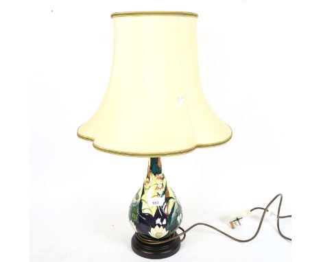 Moorcroft tube-lined table lamp and shade, with water lily decoration, height 61cm overall 