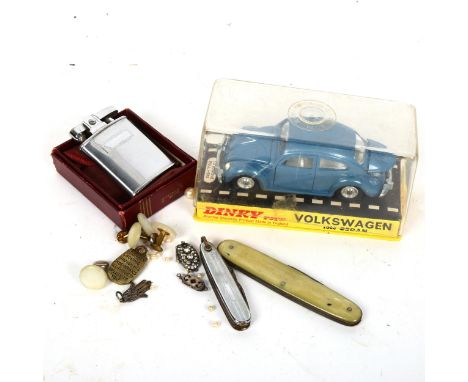 A Dinky Volkswagen, a Ronson lighter, penknives etc 