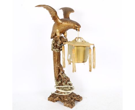 A Chinese carved and painted wood bird of prey table lamp, with silk lantern shade, height 60cm 
