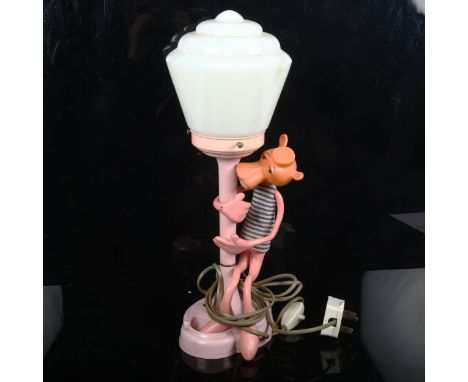 A Vintage novelty plastic Pink Panther table lamp and shade, height 43cm (A/F) 