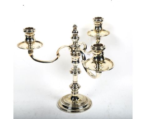 A late 20th century silver 3-branch table candelabra (converts to single candlestick), height 25cm 