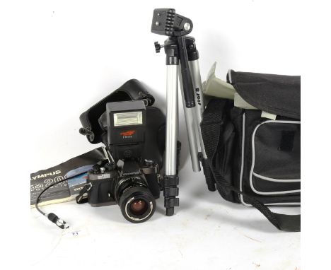 OLYMPUS - an OM2000 single lens reflex camera, with tripod hot shoe flash, and softshell case 