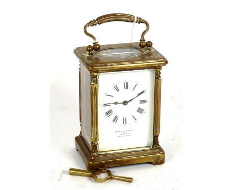 A Mappin &amp; Webb brass-cased carriage clock, white enamel dial with Roman numeral hour markers, case height 11cm, not curr