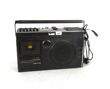 A Vintage Sharp 5P-27H radio cassette TV 