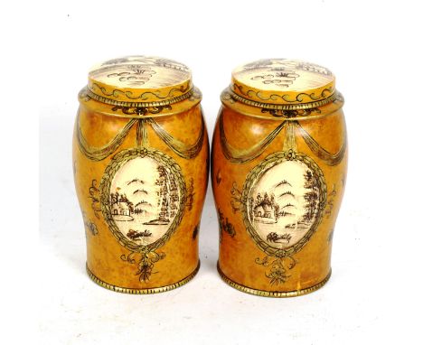 A pair of reproduction painted and gilded tea caddy canisters, height 17cm 
