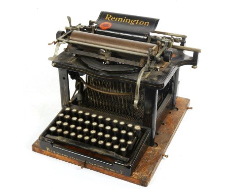A Vintage Remington No 7 upstrike typewriter, in original tin case, barrel length 23cm