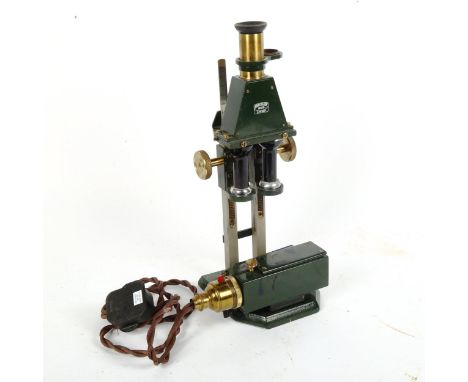 A twin lens cast-iron microscope, by J Swift &amp; Son of London, serial no. 18470, height 32cm 