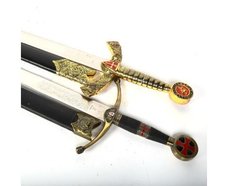 A reproduction replica Toledo sword in scabbard, and a sword ornament 