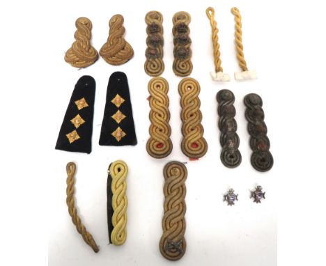 Small Selection Of Officer Shoulder Straps&nbsp; consisting pair of silver cord shoulder straps with Captain's rank. &nbsp;Si