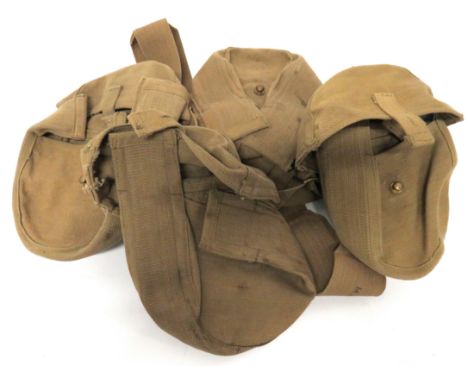 Set Of Four Lewis/Vickers K Drum Magazine Pouches khaki webbing, circular pouch with top, half circular flaps secured by bras