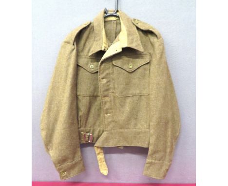 WW2 1940 Pattern Battledress Jacket Dated 1944 khaki woollen, single breasted, closed collar, short jacket. &nbsp;Lower exten