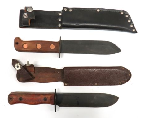 Two British Type D Survival Knives consisting 7 inch, single edged, heavy blade marked "27C/2360" and broad arrow. &nbsp;Blac